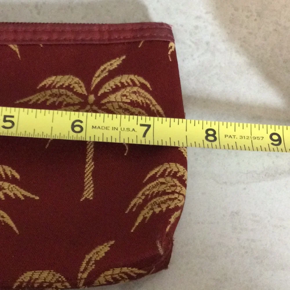 Celebrity Gold Palm-Print Pouch in Burgundy